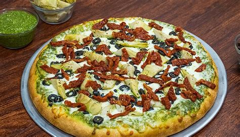 Premier pizza - Pepperoni, salami, mushrooms, black olives and Italian sausage. S - 10" $18.5 Small. M - 12" $26 Medium